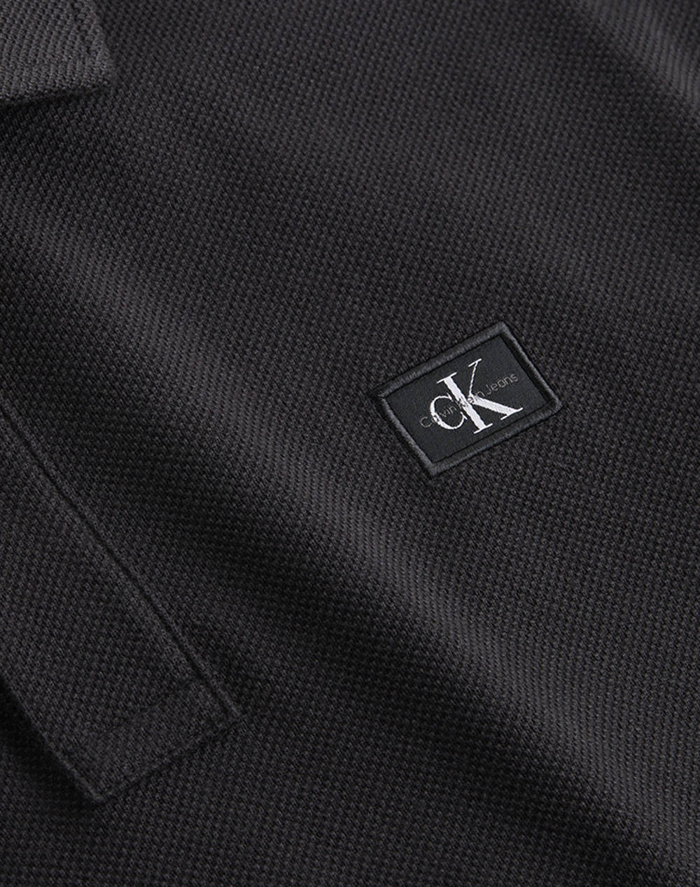 CALVIN KLEIN JEANS WOVEN LABEL POLO