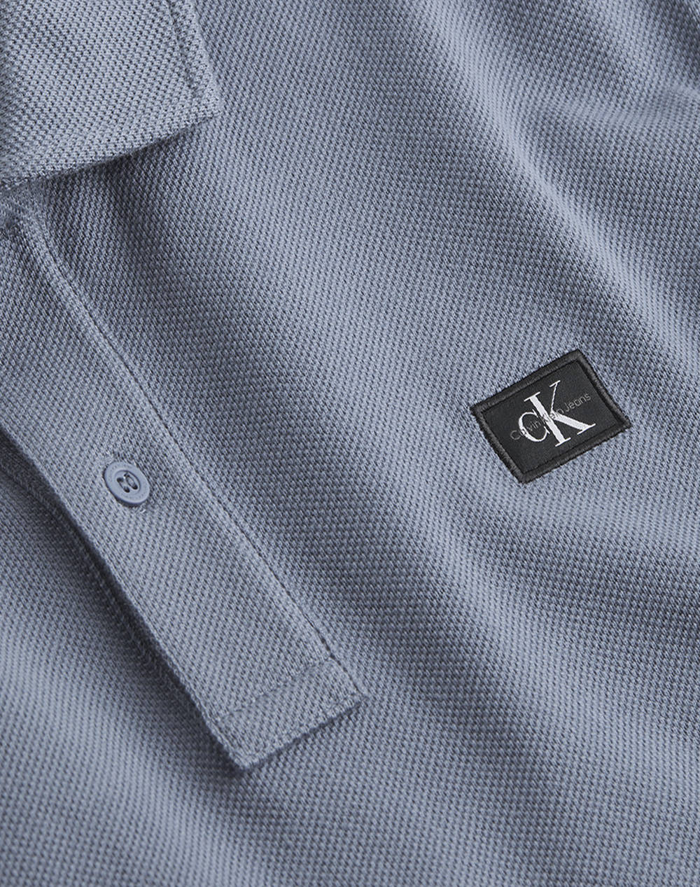 CALVIN KLEIN JEANS WOVEN LABEL POLO