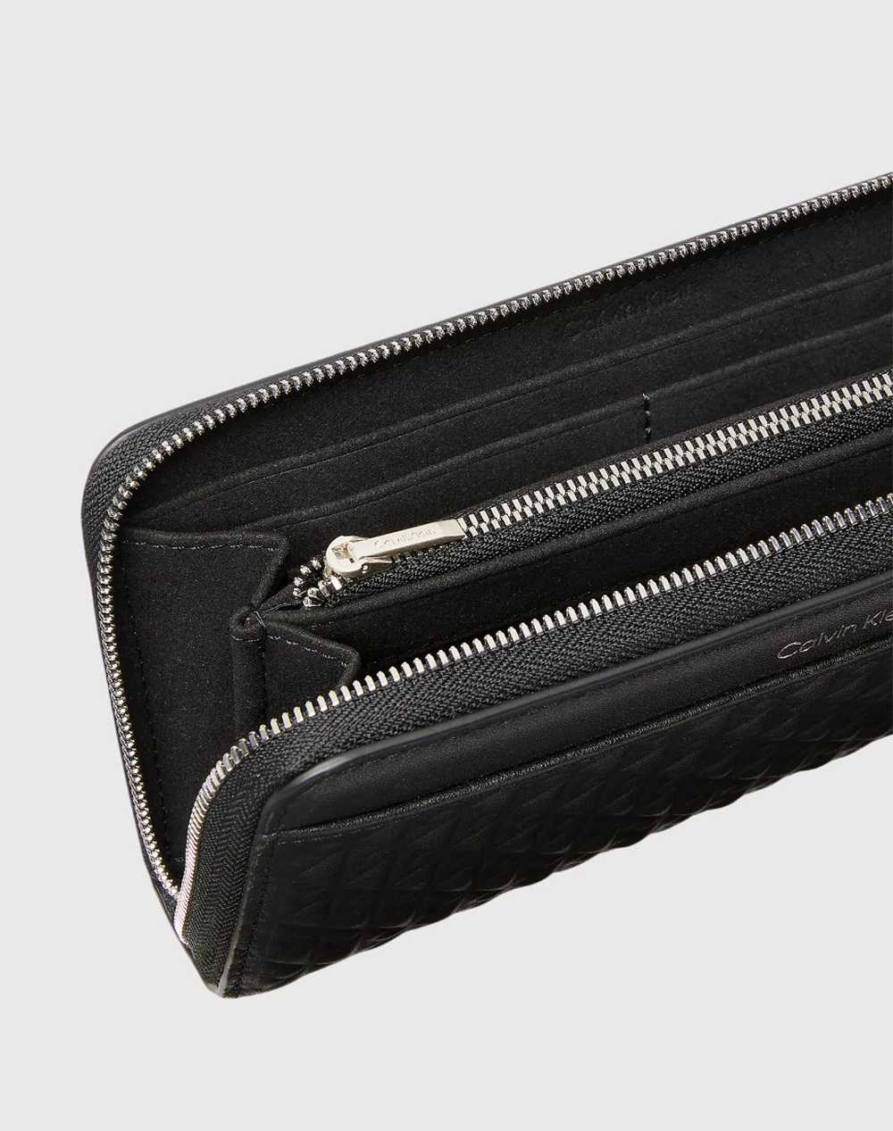 CALVIN KLEIN JEANS EMBOSSED AOP LONG ZIP AROUND