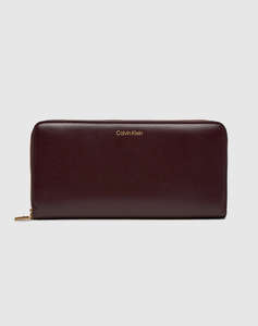 CALVIN KLEIN JEANS CK PULLER LARGE ZIP AROUND (Размери: 20 x 9см.)